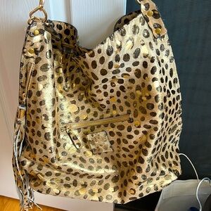 Elegant Gold and Black Polka Dot Shoulder Bag